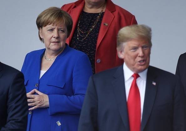 Dispută Trump- Merkel înaintea summitului NATO