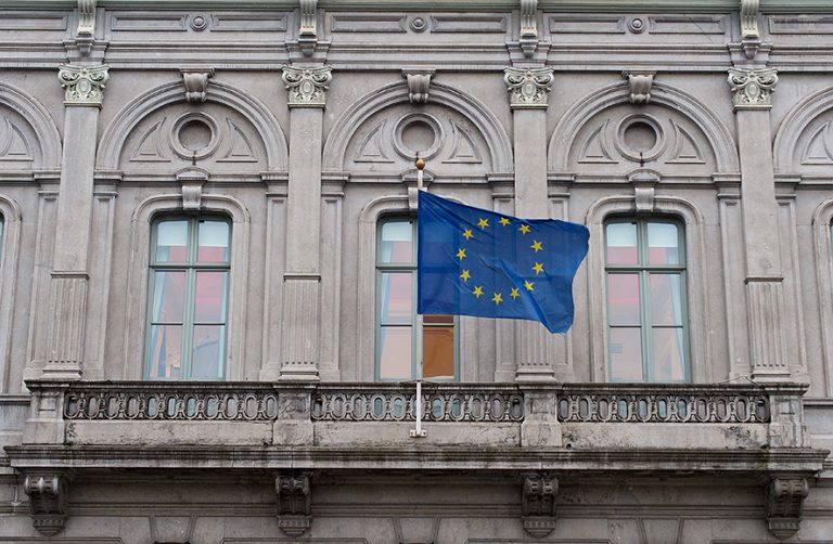 BRUSSELS, BELGIUM - FEBRUARY 25: The flag of the European Union flies from the European Parliament information office in the European Quarter on February 25, 2016 in Brussels, Belgium. Brussels is often referred to as the unofficial capital of Europe due to its concentration of pan-European institutions including the European Union (EU) and The Council Of Europe. The United Kingdom will hold a referendum on June 23 to decide whether they will remain part of the EU. (Photo by Ben Pruchnie/Getty Images)