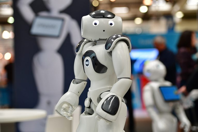 HANOVER, GERMANY - JUNE 12: NAO, the first built humanoid robot, entertains visitors at the SoftBank Robotics stand at the 2018 CeBIT technology trade fair on June 12, 2018 in Hanover, Germany. The 2018 CeBIT is running from June 11-15. (Photo by Alexander Koerner/Getty Images)