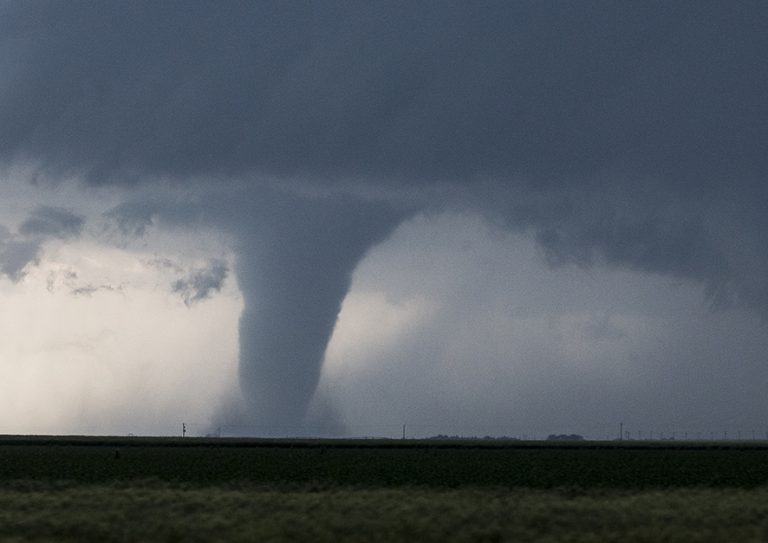 DODGE CITY, KS - MAY 24: A tornado is seen South of Dodge City, Kansas moving North on May 24, 2016 in Dodge City, Kansas. About 30 tornadoes were reported on Tuesday in five different states from Michigan to Texas. Damage to homes and property was also reported in Ford County, Kansas. (Photo by Brian Davidson/Getty Images)