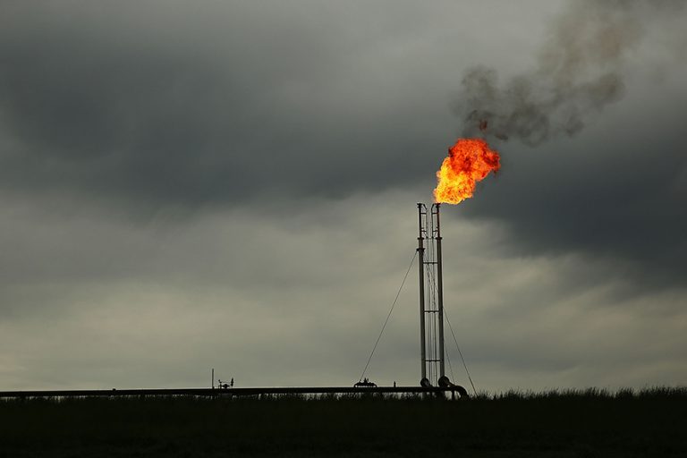 CUERO, TX - MARCH 26: Natural gas is flared off at a plant outside of the town of Cuero, Texas. Texas, which in just the last five years has tripled its oil production and delivered hundreds of billions of dollars into the economy, is looking at what could be a sustained downturn in prices. Crude oil prices today are almost 60 percent lower than they were six months ago.While the Texan economy has become more diversified over the years, oil is still the states largest monetary generator and any sustained downturn would be devastating for employment and the economy. Outplacement firm Challenger, Gray & Christmas this month said a drop in oil prices have been responsible for 39,621 job cuts in the first two months of the year. (Photo by Spencer Platt/Getty Images)