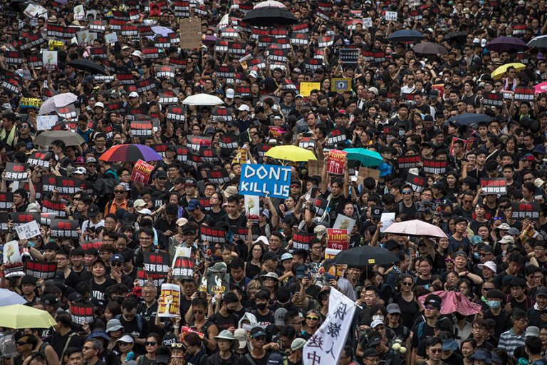 Protesters take part in a rally to demand a complete withdrawal of an extradition bill in Hong Kong, China, 16 June 2019. A day after Hong Kong Chief Executive Carrie Lam Cheng Yuet-ngor announced a 'suspension' of a controversial extradition bill in the aftermath of violent clashes where riot police fired rubber bullets, tear gas and pepper spray at protesters, thousands took to the street asking for a complete withdrawal of the bill. EPA/ROMAN PILIPEY