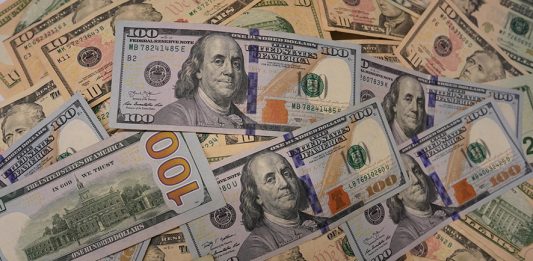 (190801) -- WASHINGTON, Aug. 1, 2019 (Xinhua) -- Photo taken on July 31, 2019 shows U.S. dollar banknotes in Washington D.C., the United States. U.S. Federal Reserve on Wednesday lowered interest rates for the first time since the 2008 global financial crisis, amid rising concerns over trade tensions, a slowing global economy and muted inflation pressures. The Federal Open Market Committee, the Fed's rate-setting body, trimmed the target for the federal funds rate by 25 basis points to a range of 2 percent to 2.25 percent after concluding its two-day policy meeting, in line with market expectation. (Xinhua/Liu Jie)