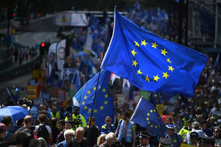 LONDON, ENGLAND - JULY 20: Protesters holding a European flag march to Parliament Square in Westminster during the "No To Boris, Yes To Europe" March on July 20, 2019 in London, England. Anti-Brexit campaigners gathered to march through central London today with the message "say no to Boris and yes to Europe" and demand an end to Brexit. The march comes just days ahead of Boris Johnson's widely expected win to become Prime Minister in the Conservative Leadership Campaign. (Photo by Chris J Ratcliffe/Getty Images)
